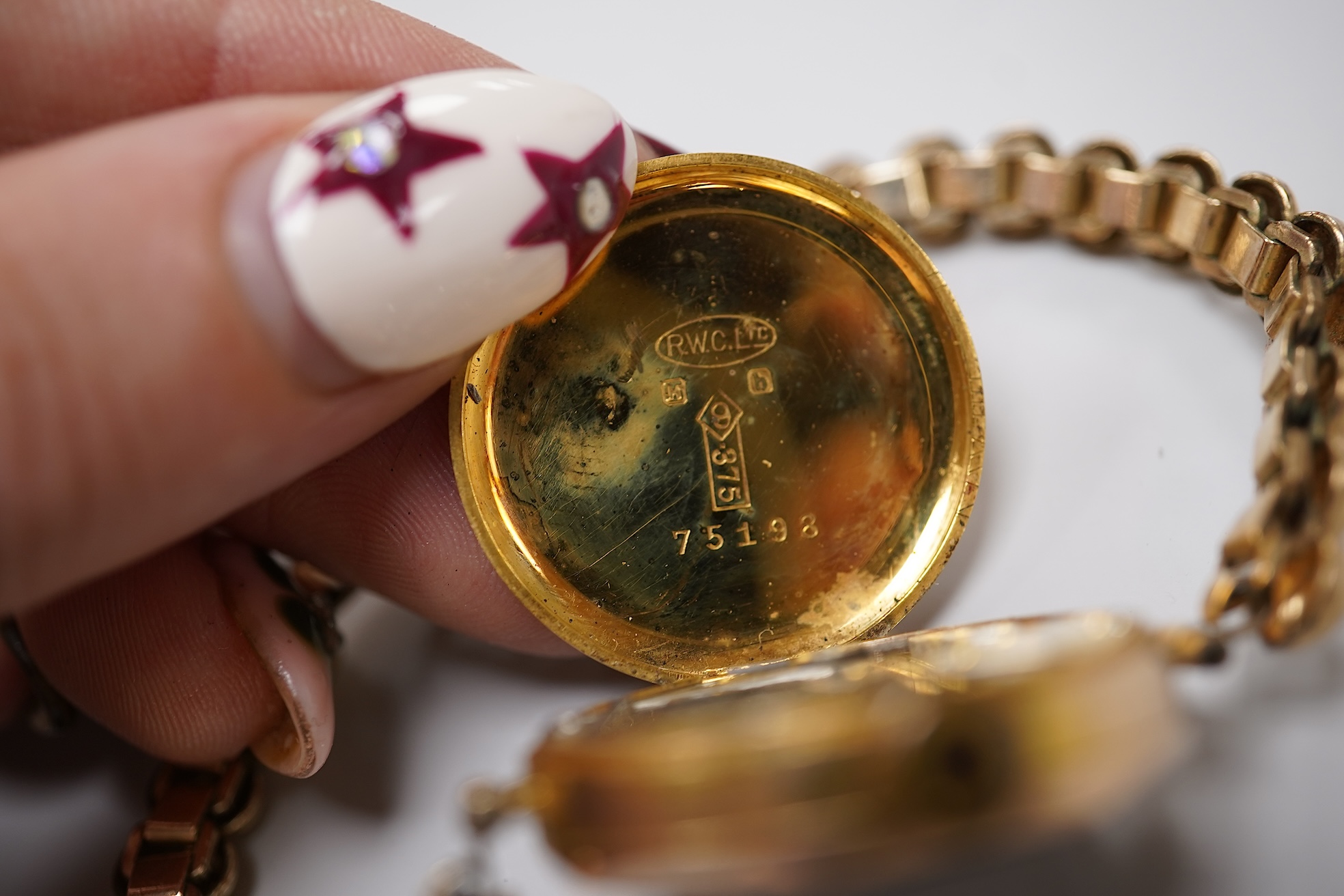 A lady's 9ct Omega manual wind wrist watch, on an associated leather strap, case diameter 20mm, together with a lady's early 20th century 9ct gold Rolco manual wind wrist watch, on a rolled gold bracelet.